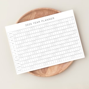 Plan your year with this 2026 Yearly Planner Printable! This digital download offers 2026 annual agenda and wall calendar template.