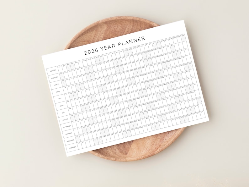 Plan your year with this 2026 Yearly Planner Printable! This digital download offers 2026 annual agenda and wall calendar template.