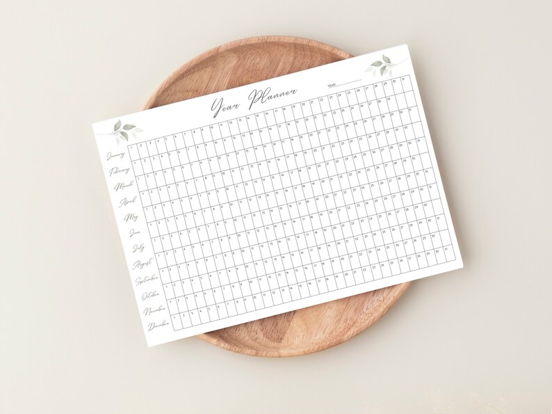 Plan your year with this Full Year Calendar Printable! This digital download offers Yearly Planner on 1 Page and wall calendar template. Perfect for professionals, students, and those seeking an efficient planning solution.