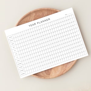 Elevate your planning with this Yearly Wall Planner. This large, printable calendar is designed for annual scheduling, providing a comprehensive view of your plans.