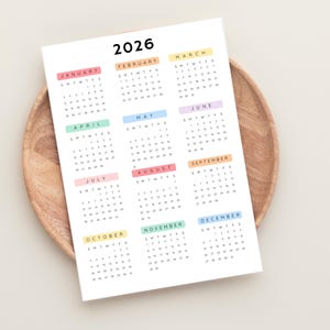 Plan ahead with this 2026 Yearly Calendar Printable! This digital download offers an annual calendar to stay organized throughout the year.