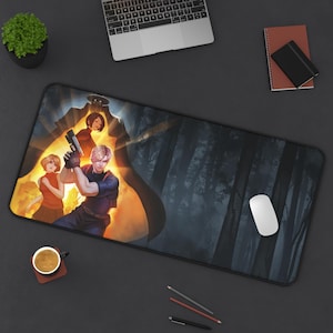 May include: A rectangular mousepad featuring a vibrant illustration of characters from a video game, set against a backdrop of a forest and a fiery explosion. The mousepad is black with a stitched edge.