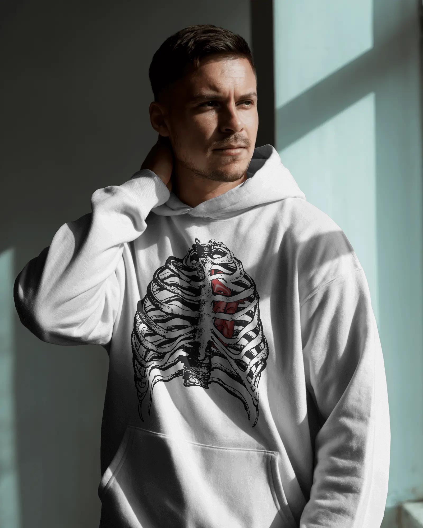 Sweat à capuche coeur intérieur cage thoracique