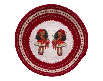 May include: Red and white rope basket with a white centre panel featuring two girls with red bows and dresses holding red gifts. The basket is decorated with a white lace trim and red hearts.