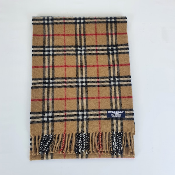 Genuine Burberry wool scarf in an excellent condition Beige colour size 174cm