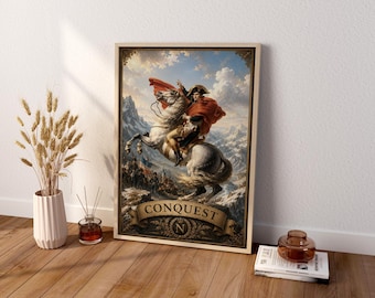 May include: A framed rectangular wall art print depicting a historical figure in a red cape riding a white horse through snowy mountains. The image features the text CONQUEST and the letter N within a decorative banner at the bottom.