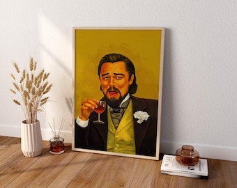 May include: A framed digital art print featuring a portrait of a man with a beard, wearing a dark suit, yellow vest, and white lapel flower, holding a small glass of red liquid against a solid mustard yellow background.