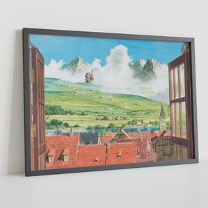 May include: A framed print of a painting depicting a view from a window. The window is open and looks out onto a small town nestled in a valley. In the distance, a large, flying machine is visible in the sky. The sky is blue and there are white clouds. The town is made up of small, colorful houses with red tile roofs. The valley is green and lush. The painting is framed in a black frame.