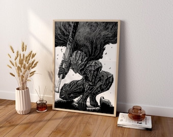 May include: A framed black and white art print featuring a crouching armoured warrior in a dark, textured suit of plate armour. The figure holds a large, heavy sword and wears a flowing, dark cape that billows behind them in a dynamic motion.