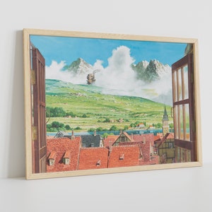 May include: A framed print of a painting depicting a view from a window. The window is open and looks out onto a small town nestled in a valley. The town is surrounded by green hills and mountains. A large, flying machine is visible in the distance, hovering over the mountains. The sky is blue and cloudy.