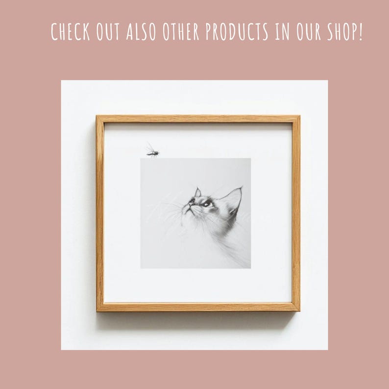 May include: A black and white pencil drawing of a cat looking up at a fly. The drawing is framed in a light wood frame.