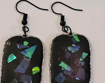 Black resin with iridescent sparkles on black hypoallergenic lever back earrings