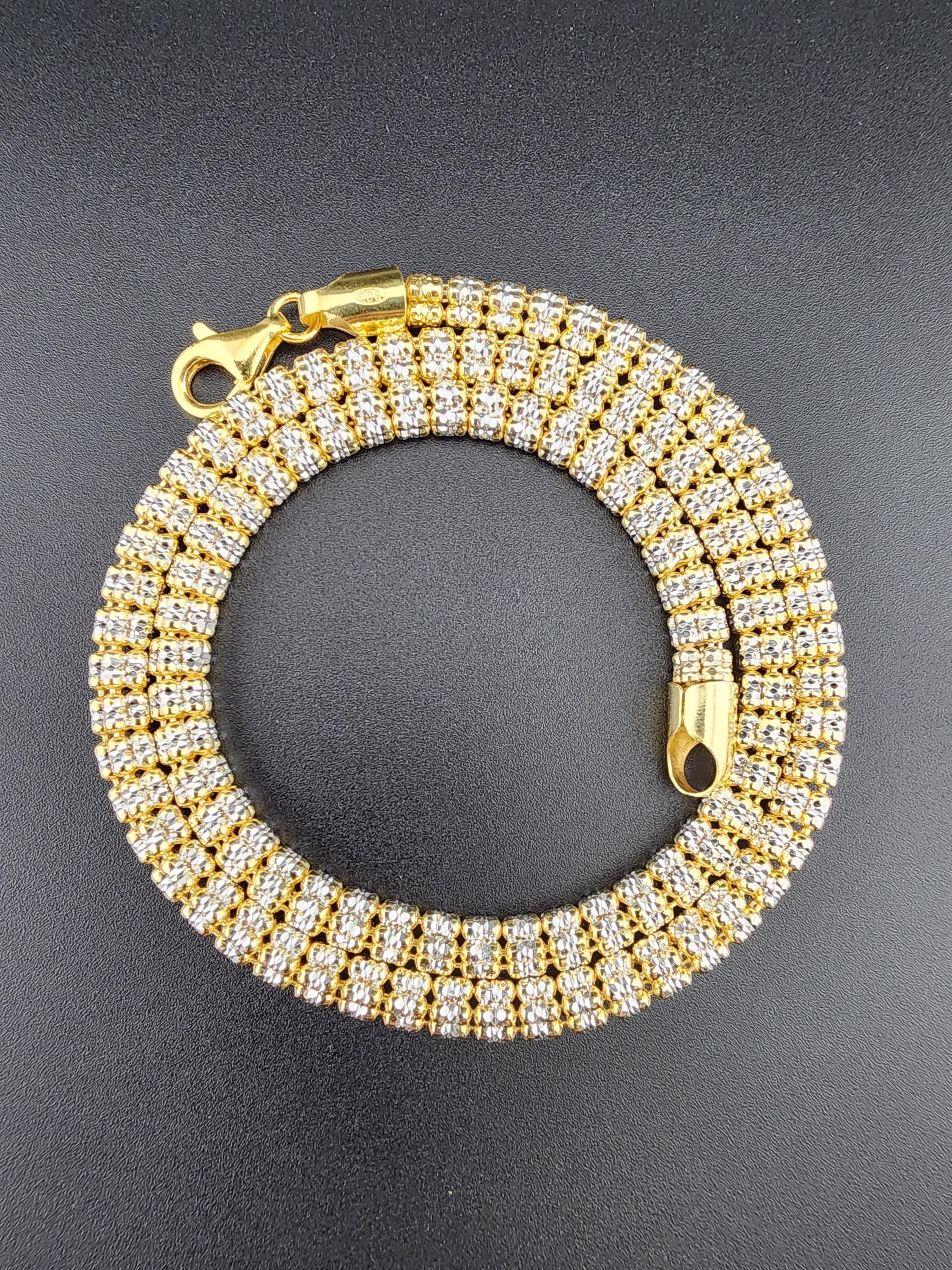 【RePLAY】BICOLOR CHAIN BRACELET RePLAY】BICOLOR CHAIN BRACELET Two-tone multi-chain and pearl bracelet