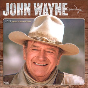 Peut inclure: Calendrier officiel 16 mois 2026 avec John Wayne. Le calendrier présente un portrait souriant de John Wayne portant un chapeau de cowboy. Le texte "JOHN WAYNE" est en haut, avec sa signature. Le calendrier est encadré d'une bordure en bois.