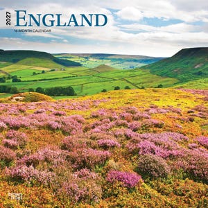 May include: A 2027 England 16-month calendar featuring a landscape photograph of rolling green hills and a foreground filled with vibrant purple and yellow heather under a blue sky with white clouds. The text reads 2027 ENGLAND 16-MONTH CALENDAR.
