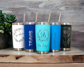 May include: Five stainless steel tumblers with lids and straws. The tumblers are personalized with names and designs, including a floral wreath, a monogram, and a dreamcatcher.