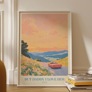 May include: A vintage-style poster featuring a pink and orange sunset over a mountain range. A red convertible car drives down a road lined with white flowers. The text "BUT DADDY I LOVE HIM" is at the bottom of the poster, with the word "TTPD" underneath.