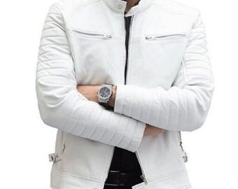 May include: A white leather jacket with a zipper closure and a stand-up collar. The jacket has a quilted design on the sleeves and a zippered pocket on the left chest.
