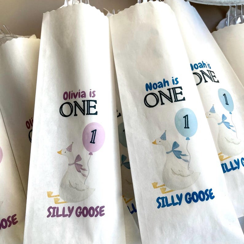 Baby 1st birthday favor featuring a one silly goose themed custom cutlery bag. One Silly Goose Birthday Girl Personalize Silverware Bag Boy Baby 1st Birthday Favor Custom Cutlery Bag Table Decor Paper Napkin Holder Idea
