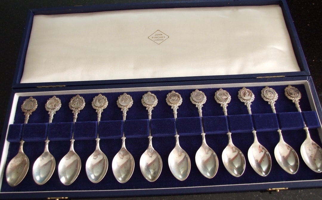 A Set of Twelve Zodiac Spoons Sculpted by David Cornell Etsy