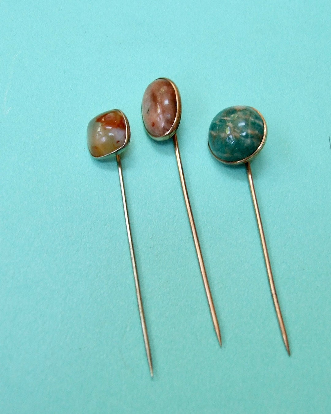 A Fabulous Group of Three Antique Gold Pins With Various Gem Stones ...