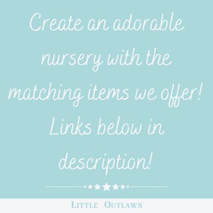 May include: A light blue background with white text that reads "Create an adorable nursery with the matching items we offer! Links below in description!" and a line of stars with the text "LITTLE OUTLAWS" below the stars.