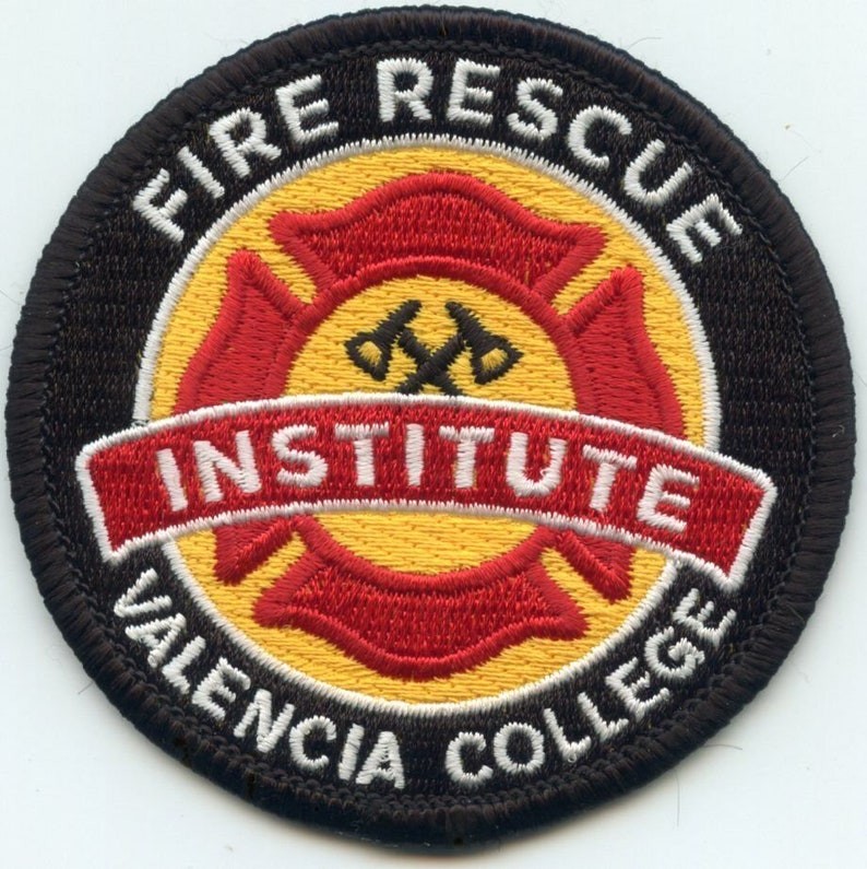 a fire rescue badge on a white background