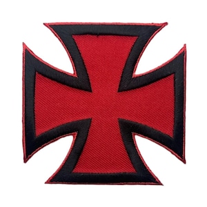 May include: An iron-on patch in the shape of an iron cross. The design features a vibrant red center with a thick black border, finished with a thin red stitched edge. The embroidery has a visible texture throughout the entire surface area.