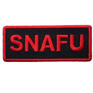 May include: A rectangular embroidered patch with a black background and a red border. The word SNAFU is stitched in bold red capital letters across the center of the patch. The design features a clean, stitched edge and a high-contrast color scheme.