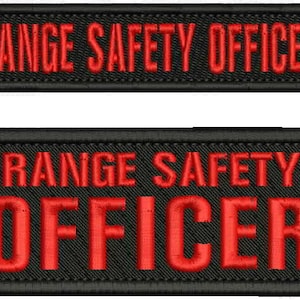 May include: Two rectangular embroidered patches with black fabric backgrounds and red stitched borders. The patches feature the text RANGE SAFETY OFFICER in bold red capital letters, with one patch in a single line and one in two lines.