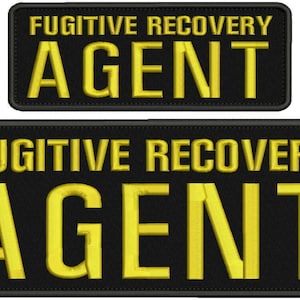 May include: Two rectangular black patches with embroidered yellow text. The top patch features the words FUGITIVE RECOVERY AGENT in two lines. The larger bottom patch also displays the text FUGITIVE RECOVERY AGENT in the same yellow font.