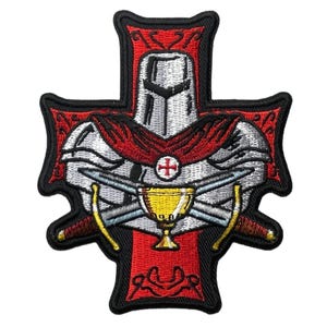 May include: An embroidered patch featuring a red cross background with a silver knight helmet, a red cape, two crossed swords, and a gold chalice. The design is outlined in black thread, showcasing detailed stitching of armor and weaponry.