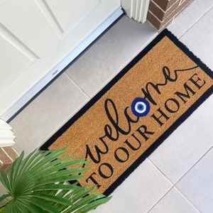 Welcome to our home Doormat with Evil eye image 1