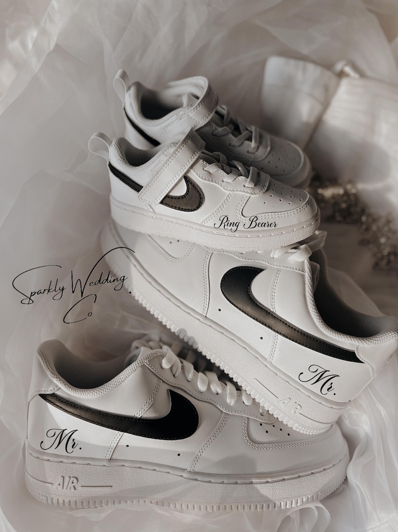 May include: White sneakers with black Nike swoosh and black text that says "Mr." and "Ring Bearer".