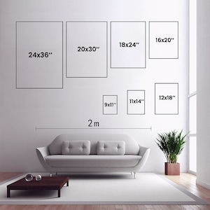 May include: A diagram showing different sizes of picture frames on a white wall. The frames are labeled with their dimensions in inches. The largest frame is 24 inches by 36 inches, and the smallest frame is 9 inches by 11 inches. The wall is 2 meters wide.