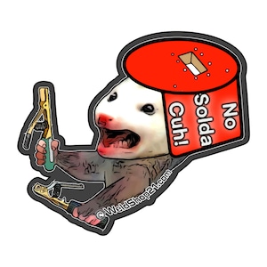 May include: A cartoon possum wearing a red bucket hat with the text "No Solda Cuh!" printed on it. The possum is holding a pair of pliers in its right hand and a pair of wire cutters in its left hand.