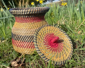 Hand woven pine needle basket with lid