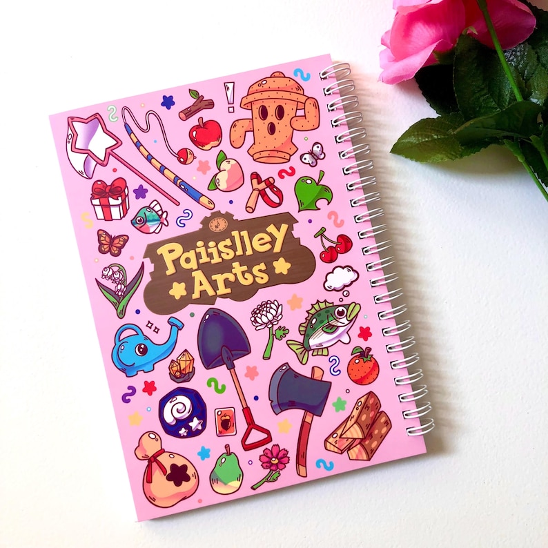 Image of the back cover of the sticker book. It is a mirrored image of the front cover, except in the wooden sign are the words "Paiislley Arts" written.