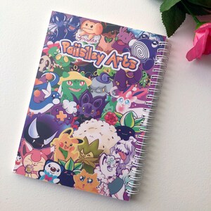 Image of the back cover of the sticker book. It is a mirror image of the front cover, however the words are different and say "Paiislley Arts"
