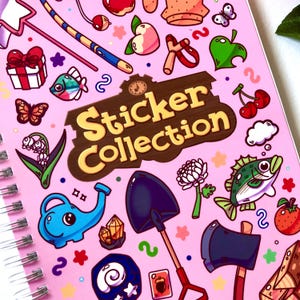 Close up view on the cover of the sticker book to highlight some of the designs.