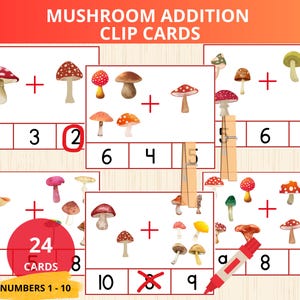 Könnte beinhalten: Lernkarten mit Pilzillustrationen zur Übung der Addition. Die Karten zeigen Additionsaufgaben mit den Zahlen 1-10, und das Set enthält 24 Karten. Ein roter Marker und Wäscheklammern aus Holz sind ebenfalls zu sehen.