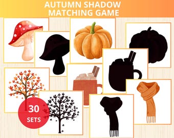 May include: A set of 30 autumn-themed shadow matching game cards. The cards feature images of a mushroom, pumpkin, a cup of hot chocolate, a scarf, and a tree. The cards are designed for children to match the images with their corresponding shadows.