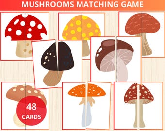 May include: A set of 48 mushroom matching game cards. The cards feature different types of mushrooms with various colors and patterns, including red with white dots, brown with white spots, and orange with yellow dots. The cards are designed for children to match the halves of each mushroom.