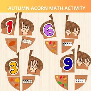 May include: An Autumn Acorn Math Activity educational set featuring four acorn-shaped puzzles. Each puzzle displays a large numeral, a hand showing the corresponding number of fingers, a ten-frame with dots, and various colourful autumn leaves.