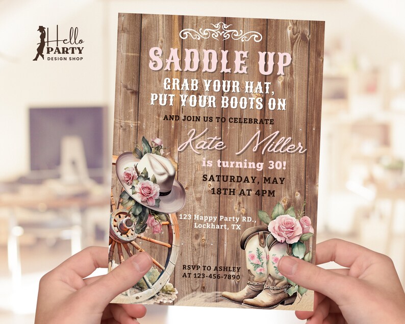 May include: A rustic wooden invitation with a pink and white cowboy hat, cowboy boots, and roses. The text reads "Saddle Up Grab Your Hat, Put Your Boots On And Join Us To Celebrate Kate Miller is turning 30! Saturday, May 18th at 4PM 123 Happy Party RD., Lockhart, TX RSVP To Ashley At 123-456-7890"
