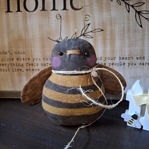 Primitive Black and Yellow Bee decoration with rustic twine tie