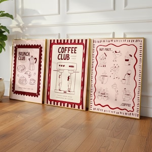 May include: A white ceramic mug with a black handle and the text "But First, Coffee" in a bold, black font. The mug is set against a blurred background, suggesting a cozy setting. The mug appears to be 12 ounces.