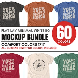 May include: A mockup bundle of 60 different colored t-shirts with the text "YOUR DESIGN HERE" and "MOCK LOBSTER CREATIVE STUDIO" printed on them. The t-shirts are laid flat on a white background.