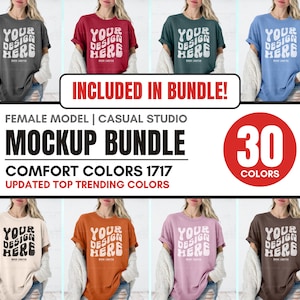 May include: Mockup bundle of 30 different color t-shirts featuring a model wearing a variety of colors. The text "YOUR DESIGN HERE" is printed on the front of each shirt. The text "COMFORT COLORS 1717 UPDATED TOP TRENDING COLORS" is also included in the image.