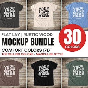 May include: A flat lay mockup bundle featuring six t-shirts in various colors, each with the text "YOUR DESIGN HERE." The image includes text that reads "FLAT LAY | RUSTIC WOOD MOCKUP BUNDLE" and "30 COLORS."